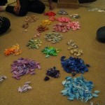 First, we separated the cranes in piles according to their colors.